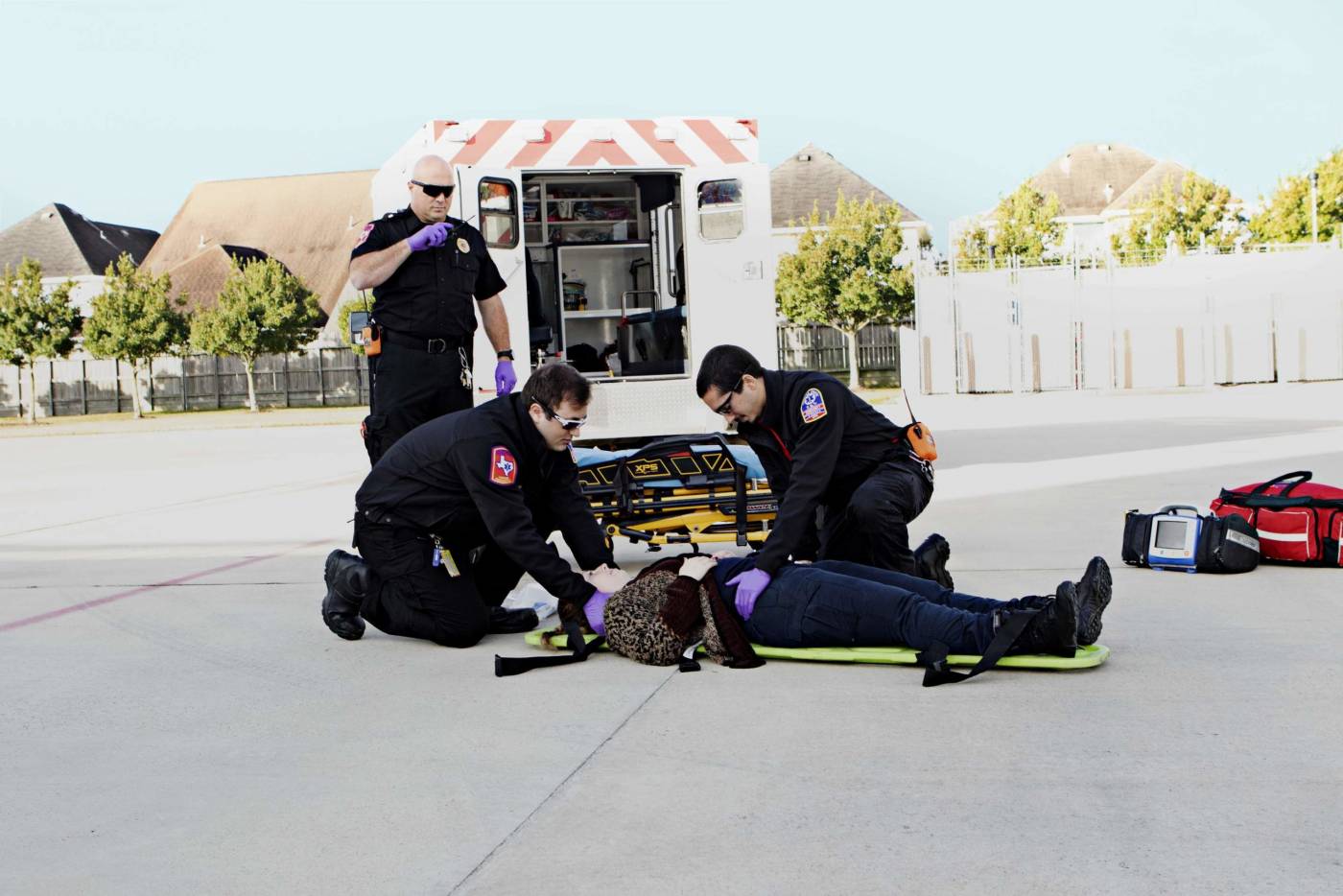 Ambulance With Patient On Ground